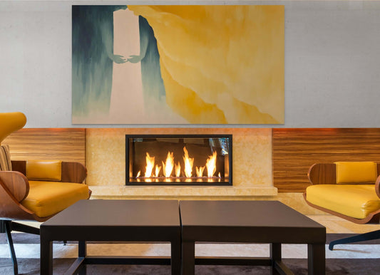 Original oil painting 'Veil of Ember' above modern fireplace in stylish living room.