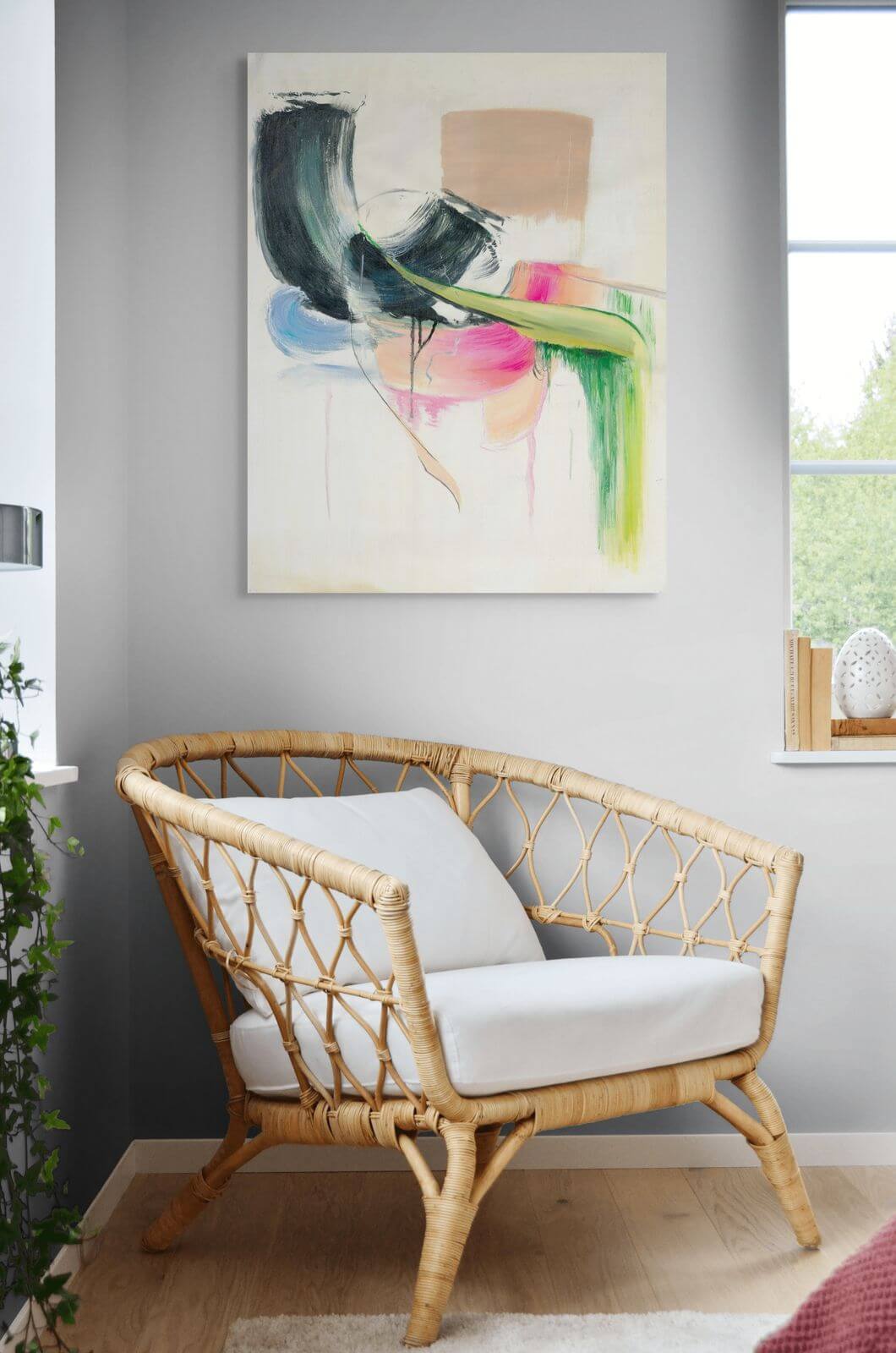 Original oil painting 'Soft Collision' displayed above a stylish chair in a modern interior.