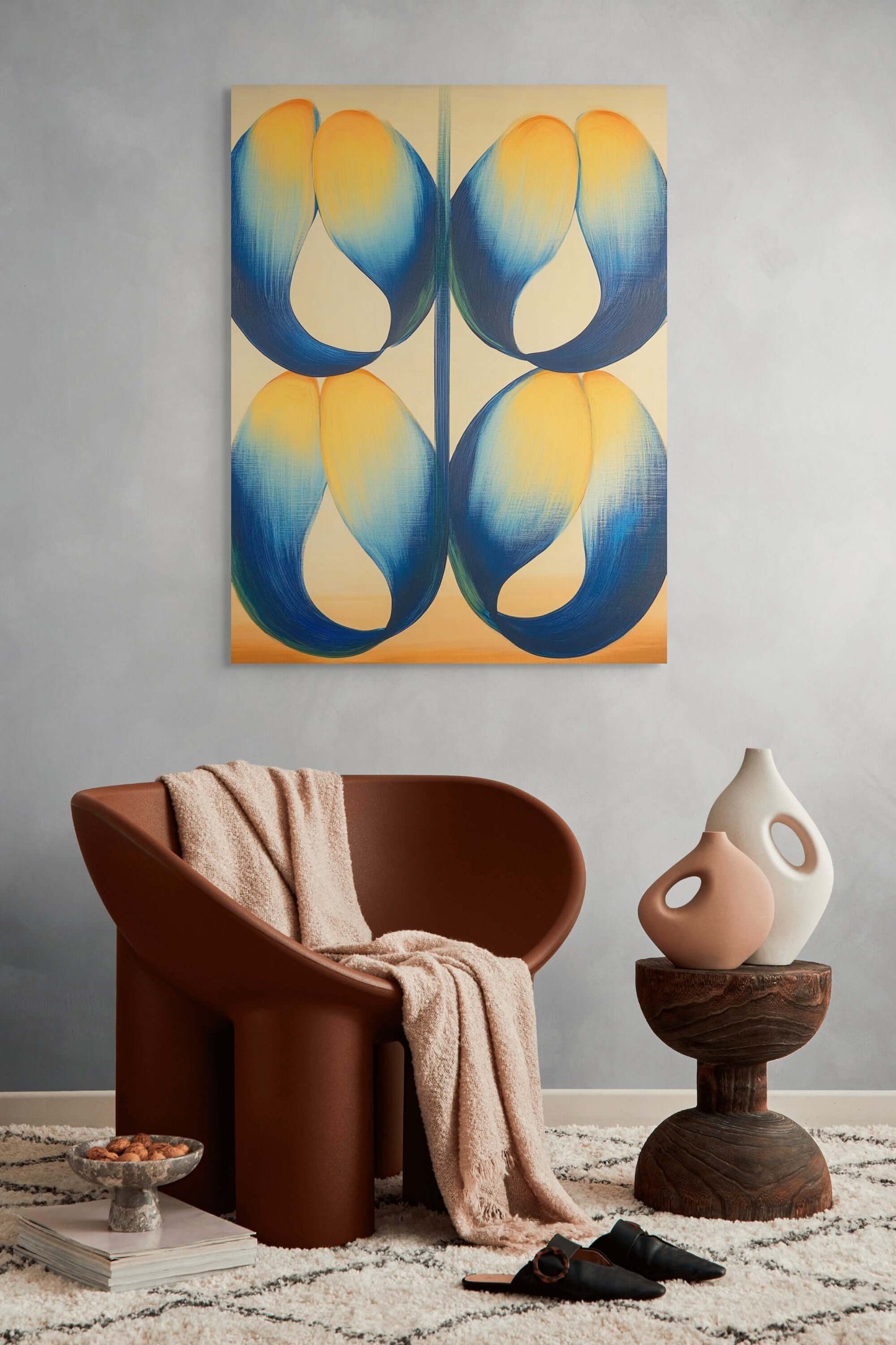 Original oil painting 'Symbiotic Bloom' displayed in a modern living room with a stylish chair and decorative elements.